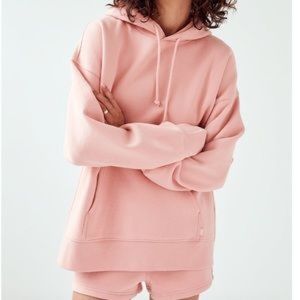 Aritzia TNA cozy fleece boyfriend hoodie in salmao